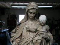 restoration of plaster Madonna