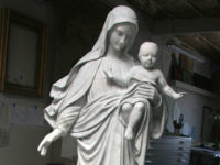 restoration of plaster Madonna