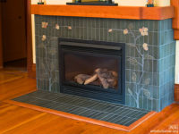 handmade art tile fireplace
