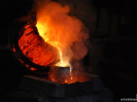 Pouring molten metal